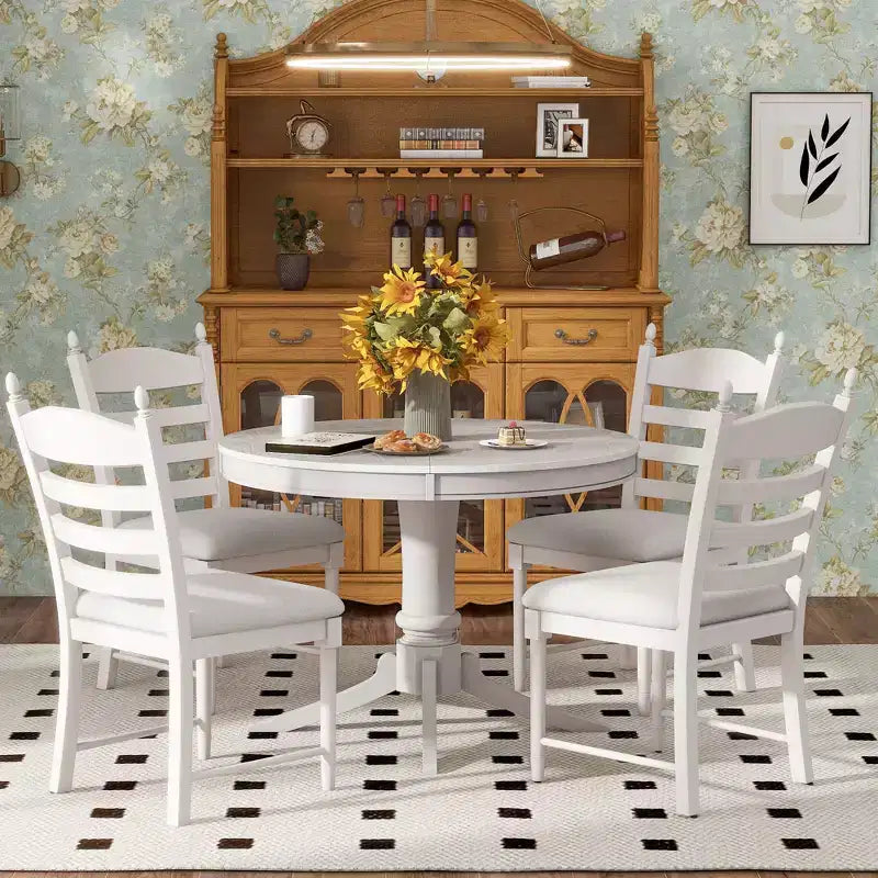 Tavolo da pranzo con piano rotondo allungabile e 4 sedie imbottite