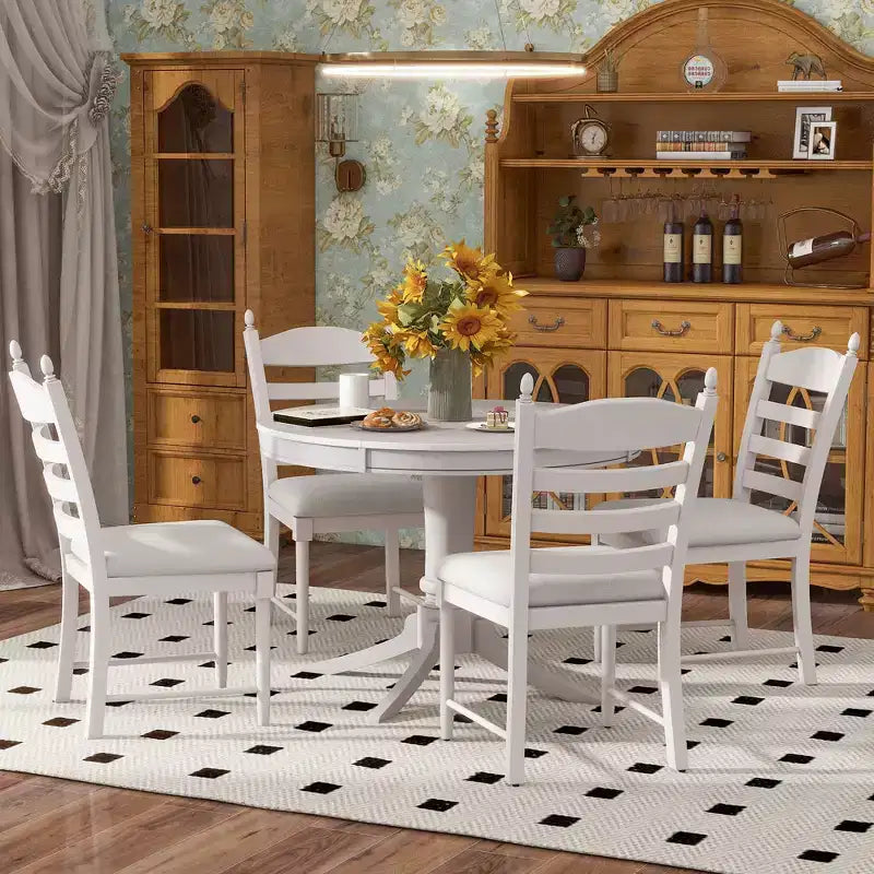 Tavolo da pranzo con piano rotondo allungabile e 4 sedie imbottite