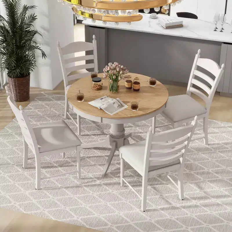 Tavolo da pranzo con piano rotondo allungabile e 4 sedie imbottite