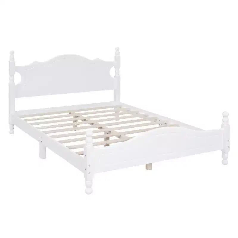 Base letto in legno con montanti torniti