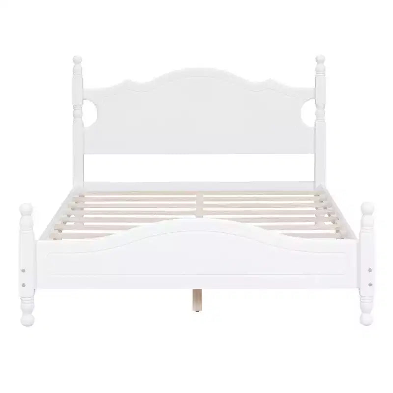 Base letto in legno con montanti torniti