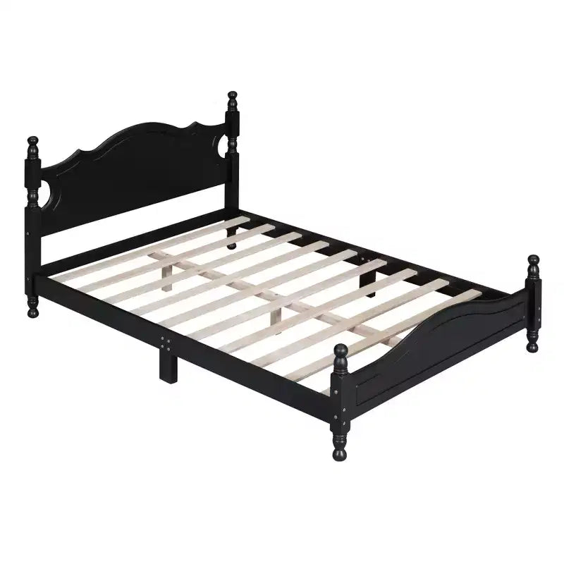 Base letto in legno con montanti torniti