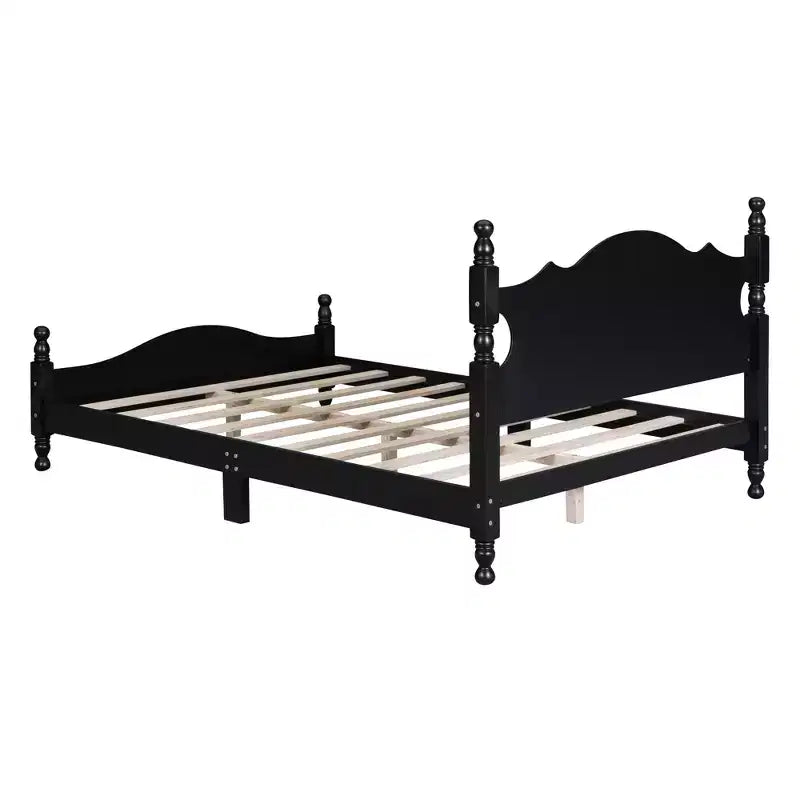 Base letto in legno con montanti torniti