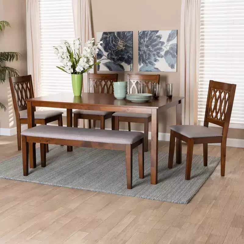 Tavolo da pranzo moderno in tessuto e legno con sedie